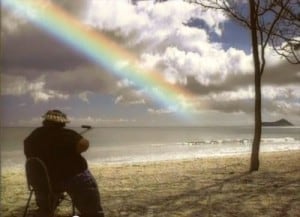 Israel Kamakawiwo'ole singing on the beach in Hawaii